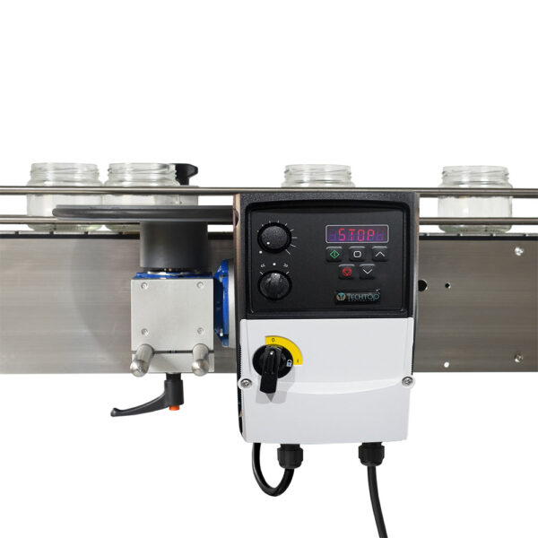 Close-up of Packserv PSW-10 Spacing Wheel with bottle containers in motion