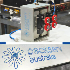 Close-up view of Packserv's trigger pack head, showcasing its intricate design and precision engineering.
