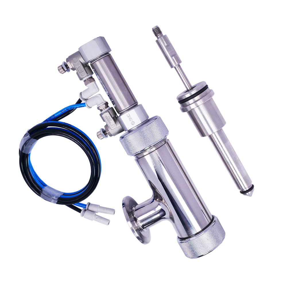 Positive Shut-Off Nozzle, 100mm length and 16mm diameter, outward-opening design for precision filling operations.