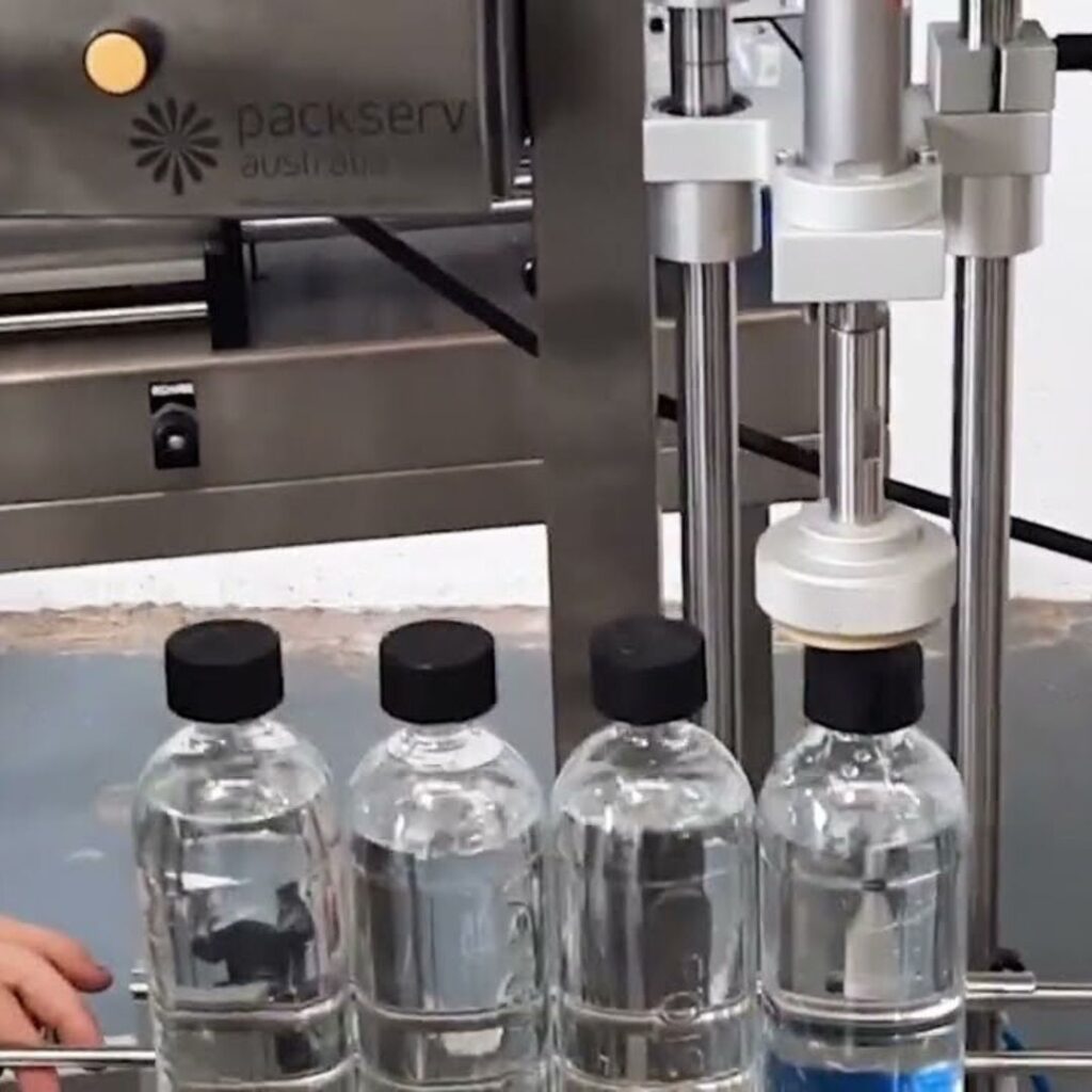 A detailed demonstration of capping machinery by Packserv Australia, showcasing efficiency and precision.