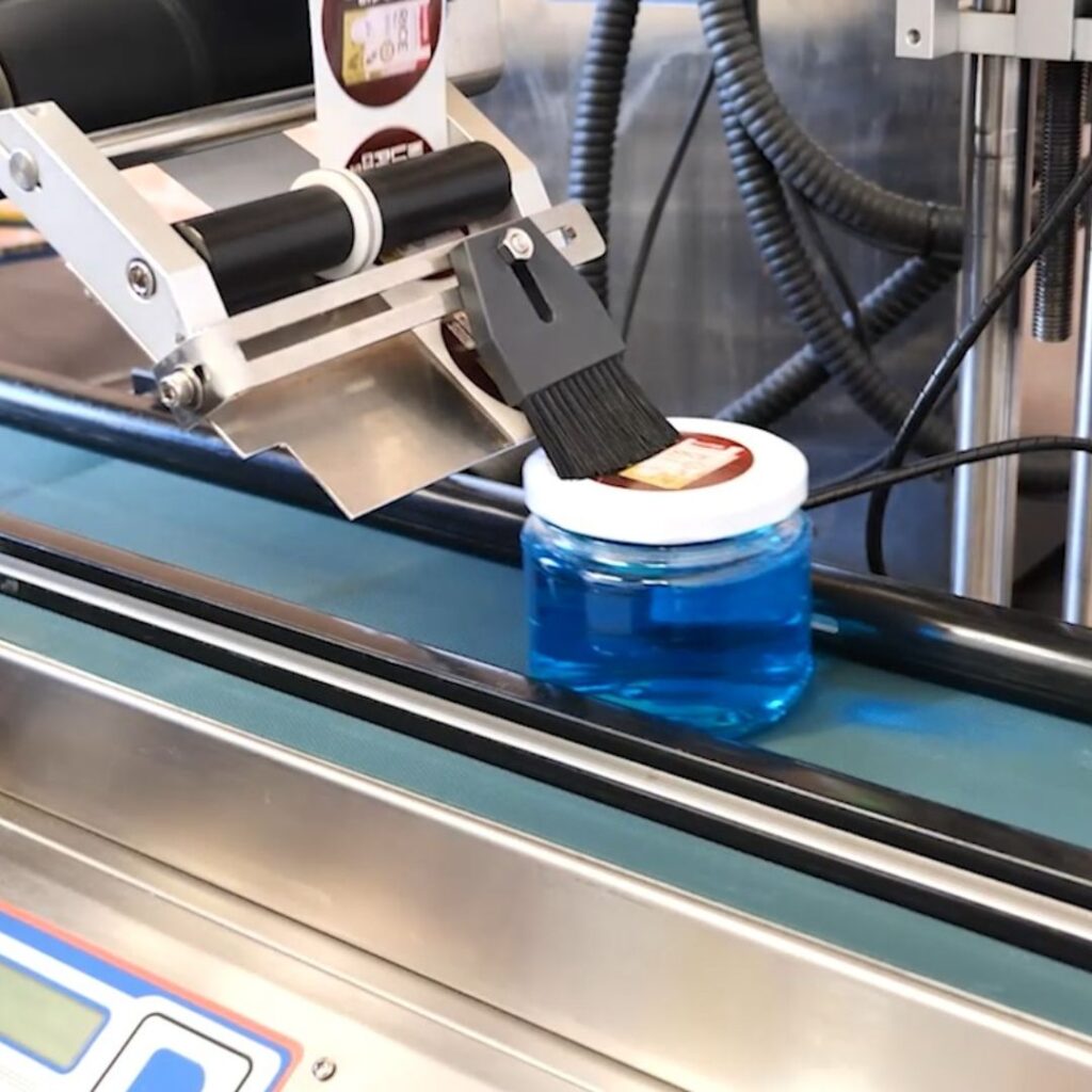 A demonstration of Packserv Australia's labelling machinery, showcasing precision and efficiency in applying labels to products.